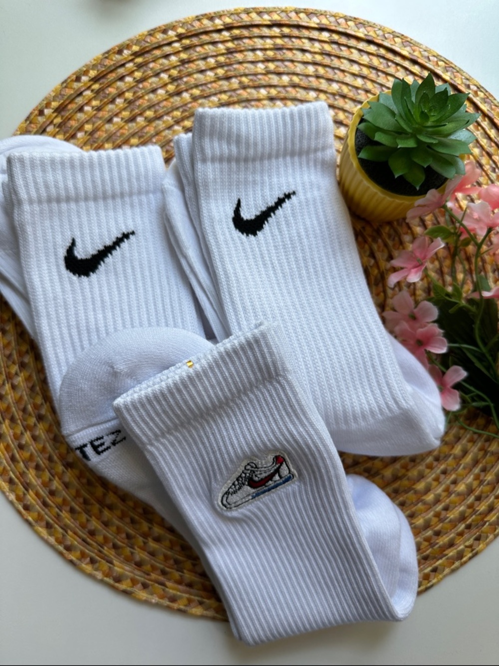Nike White Crew Socks with Black Swoosh and Small Multicolor Patch - Pair